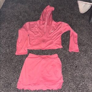 Reebok Coral Apparel skort and matching zip up NWOT never worn